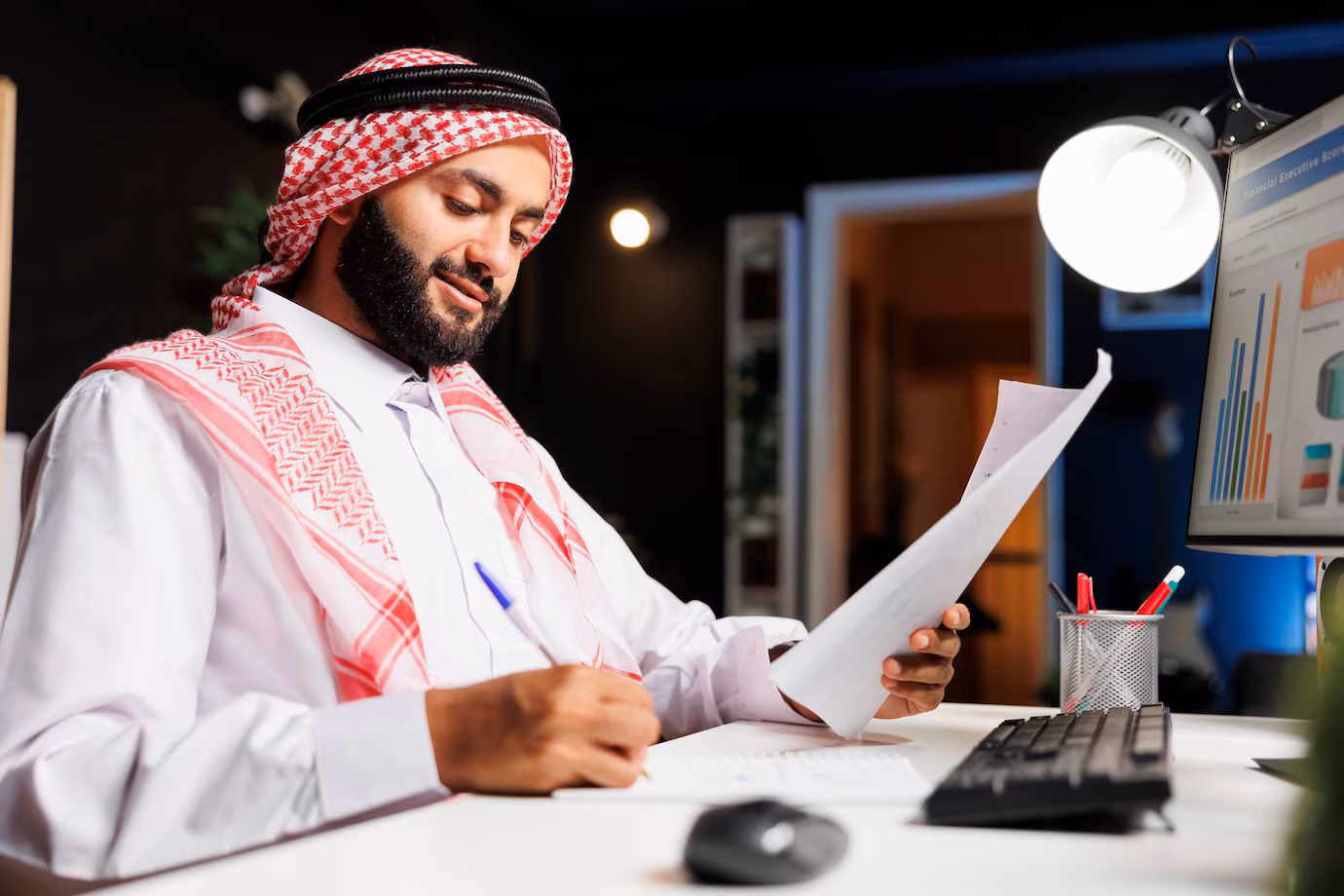 Student learning Quran on laptop with data protection and personalized learning icons